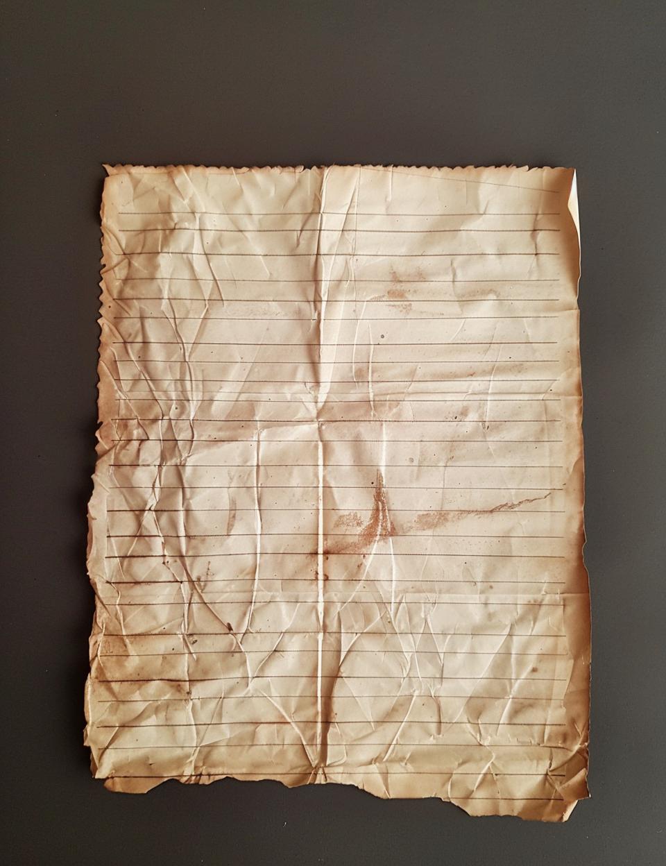 vintage  lined  paper  Finland  scuffed  tape  1855  black  old  background 961903